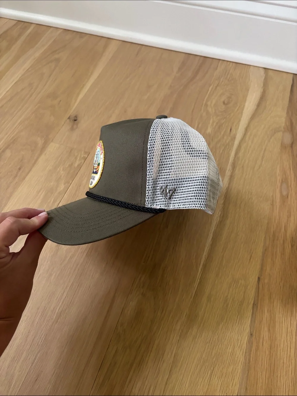 Olive and White Trucker Hat with Embroidered Mets Patch